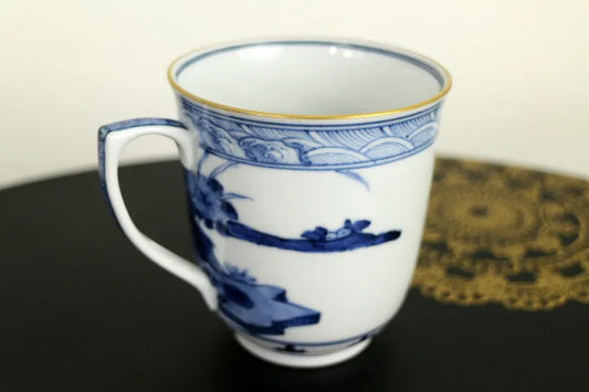 KUTANI {IMPERIAL HOUSEHOLD AGENCY OFFICIAL KILN} JAPANESE MUG CUP (BLUE AND WHITE FLORAL BIRD PATTERN) / CYOZA YAMAMOTO
