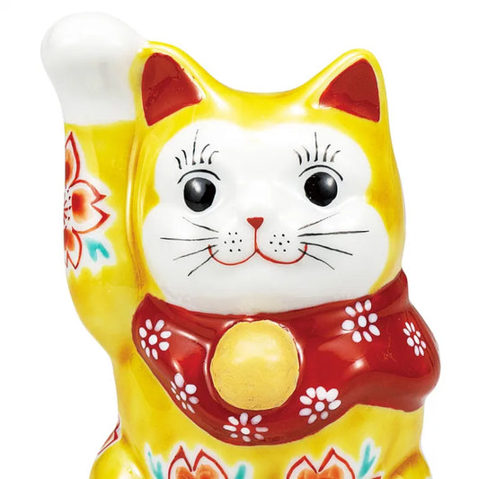 KUTANI WARE MANEKI NEKO – LUCKY CAT FIGURINE IN YELLOW GLAZE WITH SAKURA (CHERRY BLOSSOM) MOTIF