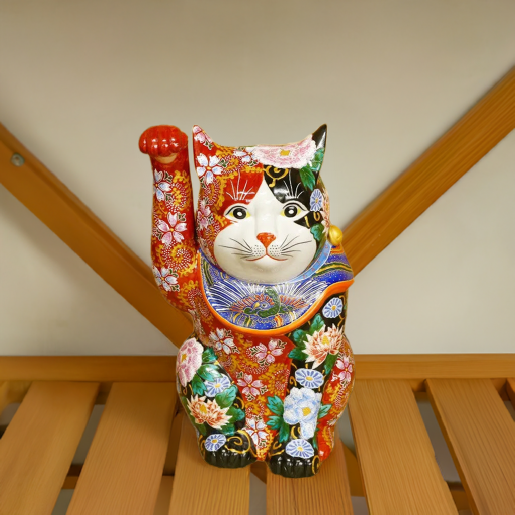 KUTANI WARE LUCKY CAT (MANEKI NEKO) RED AND BLACK FLORAL RAISED DECORATION (RIGHT)