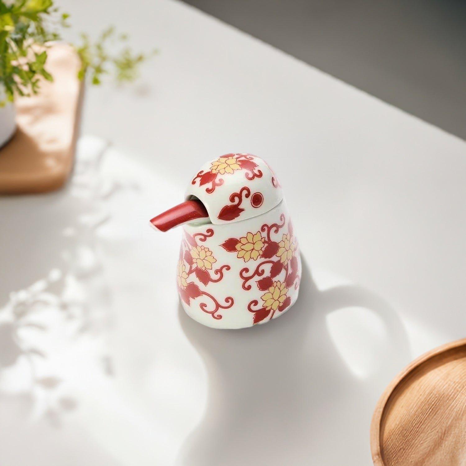 KOURAKU KILN ARITA NISHIKI PURPLE ARABESQUE KINGFISHER-SHAPED SOY SAUCE DISPENSER