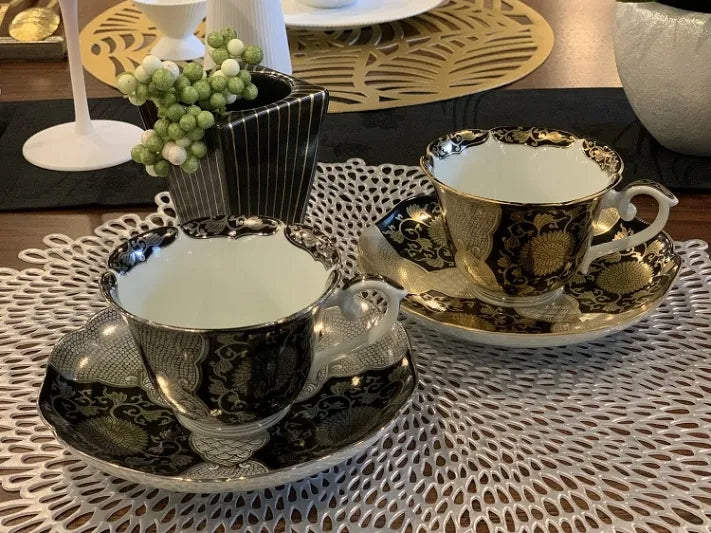 ARITA COFFEE CUP BLACK GROUND TEACUP WITH GOLD CHRYSANTHEMUM DESIGN/ TOKUKŌ KILN