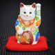KUTANI JAPANESE LUCKY CAT (MANEKI NEKO) HOLDING A KOBAN COIN WITH "WHITE DECORATION