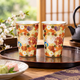 JAPANESE KUTANI WARE PAIR OF FREE CUPS KIN-HANAZUME