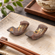KUTANI WARE PAIR CHOPSTICK RESTS WITH GOLD LEAF