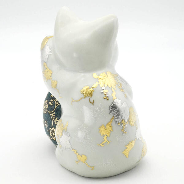 KUTANI DARUMA BECKONING CAT (LEFT HAND BECKONING CUSTOMERS) – SWIRL PATTERN WITH BLUE BEAD EMBELLISHMENT AND GILDED TREASURES ARABESQUE, WHITE AND PLATINUM GRAPE MOTIF WITH WHITE BEAD EMBELLISHMENT/KINGYOKU NAKADA