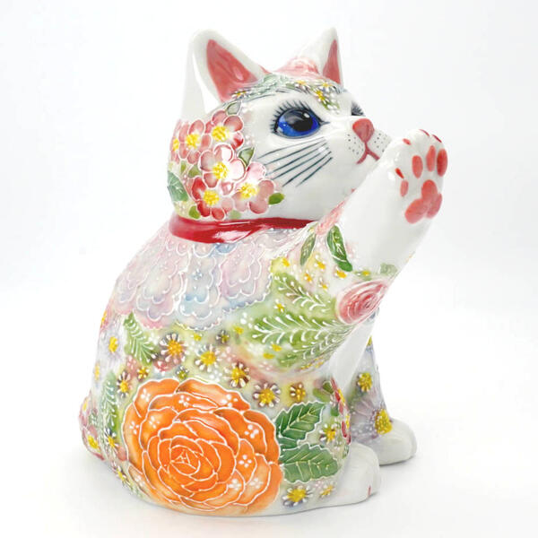 JAPANESE KUTANI WARE MANEKI NEKO LUCKY CAT – RIGHT PAW RAISED FOR WEALTH, HAND-PAINTED ITCHIN FLORAL DESIGN WITH PINK APRON BY KUNIKO SHIMONO