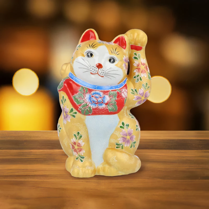 KUTANI WARE LUCKY CAT(MANEKI NEKO) WITH YELLOW BASE AND CHERRY BLOSSOM RAISED DESIGN (LEFT PAW RAISED)